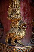 Chiang Mai - The Wat Phra Singh temple. Detail of the entrance door of the ubosot (ordination hall). 